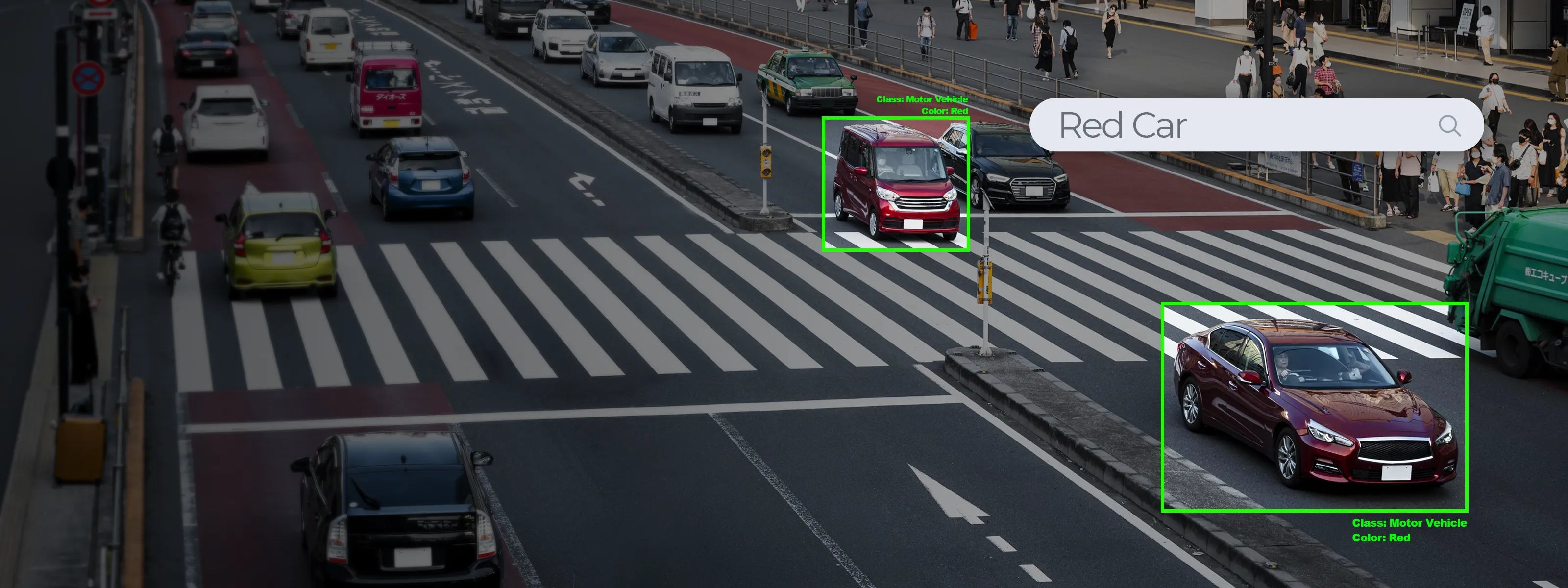 Traffic scene with a red car highlighted by a computer vision system on a crosswalk.